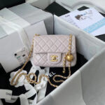 CHANEL-Beige-Mini-Pearl-Crush-Bag-with-gold-ball.png