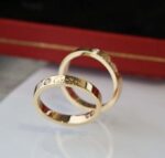 v gold generation Cartier signature ring